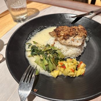 Monkeypod Kitchen by Merriman - Organic Macadamia Nut Crusted Mahi Mahi, so fresh and just perfectly seasoned, the mango slaw adds the perfect touch. - New American Near Me - Kihei, Hawaii Monkeypod Kitchen by Merriman - Organic Macadamia Nut Crusted Mahi Mahi, so fresh and just perfectly seasoned, the mango slaw adds the perfect touch. - New American Near Me - Kihei, Hawaii