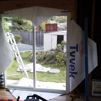 Robert Bimbi Construction - a view of a yard through a window - General Contractors Near Me - San Jose, California