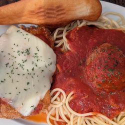 Towpath Tavern - Chicken Parmesan, spaghetti, sauce is sweet and tasty bread stick and a generous side salad loaded with veggies and cheese $14.95 !