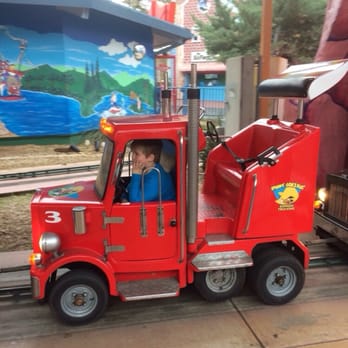 Six Flags Over Texas - Last mini truck ride he will probably take...it's not fast enough momma! - Amusement Parks Near Me - Arlington, Texas