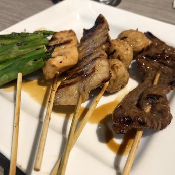 Two Tides Bar - Yakitori. Mmm! Asparagus, chicken, pork belly, tsukune, and beef. A scrumptious array! - Bars Near Me - Honolulu, Hawaii Two Tides Bar - Yakitori. Mmm! Asparagus, chicken, pork belly, tsukune, and beef. A scrumptious array! - Bars Near Me - Honolulu, Hawaii