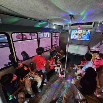 Party Bus 808 - Kids just having fun playing video games! - Party Bus Rentals Near Me - Kapolei, Hawaii Party Bus 808 - Kids just having fun playing video games! - Party Bus Rentals Near Me - Kapolei, Hawaii
