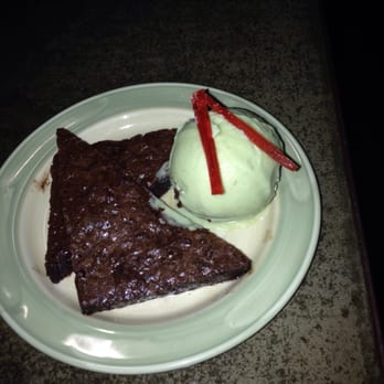 The Basement - Soft chocolate brownie with house made avocado ice cream and amazing strips of candied hot pepper strips. - Pubs Near Me - Edinburgh, EDH The Basement - Soft chocolate brownie with house made avocado ice cream and amazing strips of candied hot pepper strips. - Pubs Near Me - Edinburgh, EDH