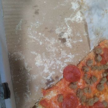 The Loomis Bar - Excess flour left I nthe bottom of the box after taking pizza out. - Bars Near Me - Clarion, Pennsylvania