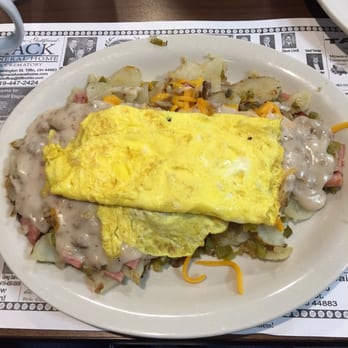 Gw's Fine Food and Spirits - "Bob's The Mess" scrambled eggs on top of home fries, ham, cheddar cheese, mushrooms, onions and peppers, smothered with sausage gravy. - American Near Me - Tiffin, Ohio Gw's Fine Food and Spirits - "Bob's The Mess" scrambled eggs on top of home fries, ham, cheddar cheese, mushrooms, onions and peppers, smothered with sausage gravy. - American Near Me - Tiffin, Ohio