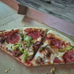Pizza Hut - Little cheese, paper crust and minimal toppings with a high price $61.77 for 2 medium pizza and bread sticks. High priced low quality food!