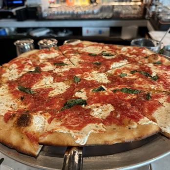 Juliana’s Pizza - Margarita pizza ordered at the bar. - Pizza Near Me - West Palm Beach, Florida Juliana’s Pizza - Margarita pizza ordered at the bar. - Pizza Near Me - West Palm Beach, Florida