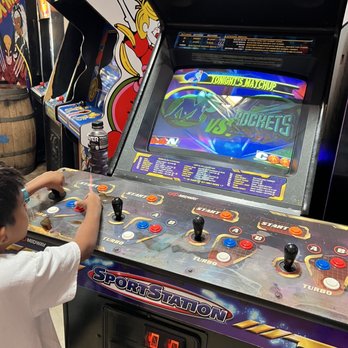 Cidercade Dallas - Kid playing - Cideries Near Me - Dallas, Texas Cidercade Dallas - Kid playing - Cideries Near Me - Dallas, Texas