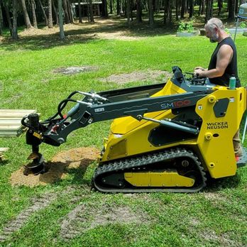 Jacques Outdoor Solutions - Auger drilling attachment. - Excavation Services Near Me - Conroe, Texas