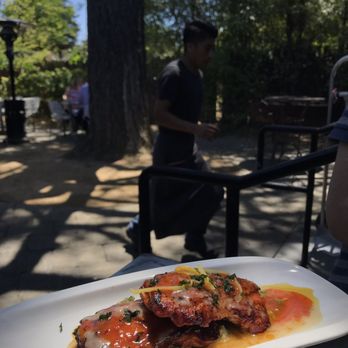 Bravas Bar de Tapas - Crispy skin chicken thighs with green olive tapenade and Aleppo vinaigrette ($12) - Spanish Near Me - Healdsburg, California