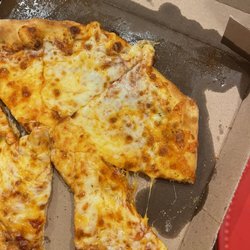 Domino's Pizza - Extra cheese pizza. More like extra grease