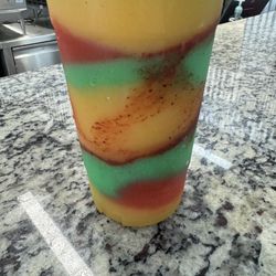 Daquiri Blast - Mango, liquid marijuana ( not marijuana),  & strawberry. Tajín and chamoy.