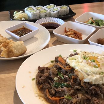 Bonsai - Bulgogi Beef bowl with fried egg on top, Avocado/cucumber sushi roll in back, fried dumplings in the middle - Japanese Near Me - Upper Arlington, Ohio Bonsai - Bulgogi Beef bowl with fried egg on top, Avocado/cucumber sushi roll in back, fried dumplings in the middle - Japanese Near Me - Upper Arlington, Ohio