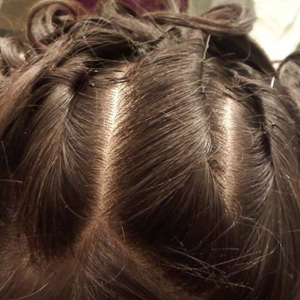 (Lynn's creation) I loved the top part of my styled 'do.  It was for a wedding =)