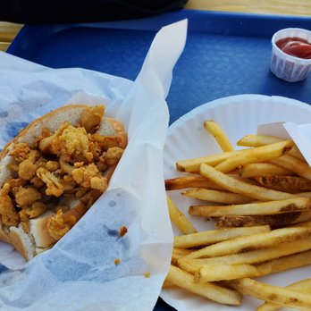 Mac's On the Pier - clam strips roll, side of fries - Seafood Near Me - Wellfleet, Massachusetts Mac's On the Pier - clam strips roll, side of fries - Seafood Near Me - Wellfleet, Massachusetts
