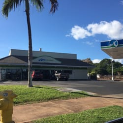 Aloha Gas - Right on the corner across the street from the back side of Sacred Heart Church