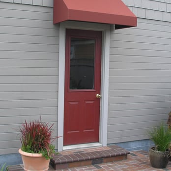 Northcoast Awning - Awnings can soften the facade of a dull building. This awning, over the garage door, improved the view out our back window. - General Contractors Near Me - Mckinleyville, California Northcoast Awning - Awnings can soften the facade of a dull building. This awning, over the garage door, improved the view out our back window. - General Contractors Near Me - Mckinleyville, California