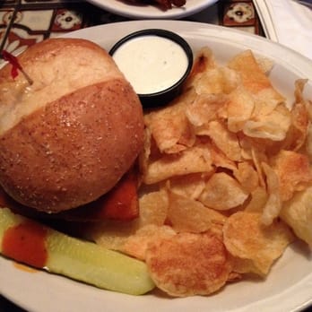 The Thurman Cafe - Buffalo chicken sandwich and chips! - Bars Near Me - Columbus, Ohio
