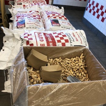 Five Guys - a pile of peanuts in a box - Burgers Near Me - Concord, California Five Guys - a pile of peanuts in a box - Burgers Near Me - Concord, California