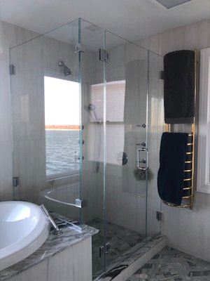 Custom Glass Showers - Glass showers are the perfect blend of elegance and functionality for any bathroom space. They provide a sleek, modern look while being easy to clean and maintain, adding value and style to your property. Whether you're upgrading for aesthetic appeal or practicality, glass doors create an open, airy feel that clients and guests will love. Plus, with customization options, they can fit seamlessly into any design. Custom Glass Showers - Glass showers are the perfect blend of elegance and functionality for any bathroom space. They provide a sleek, modern look while being easy to clean and maintain, adding value and style to your property. Whether you're upgrading for aesthetic appeal or practicality, glass doors create an open, airy feel that clients and guests will love. Plus, with customization options, they can fit seamlessly into any design.