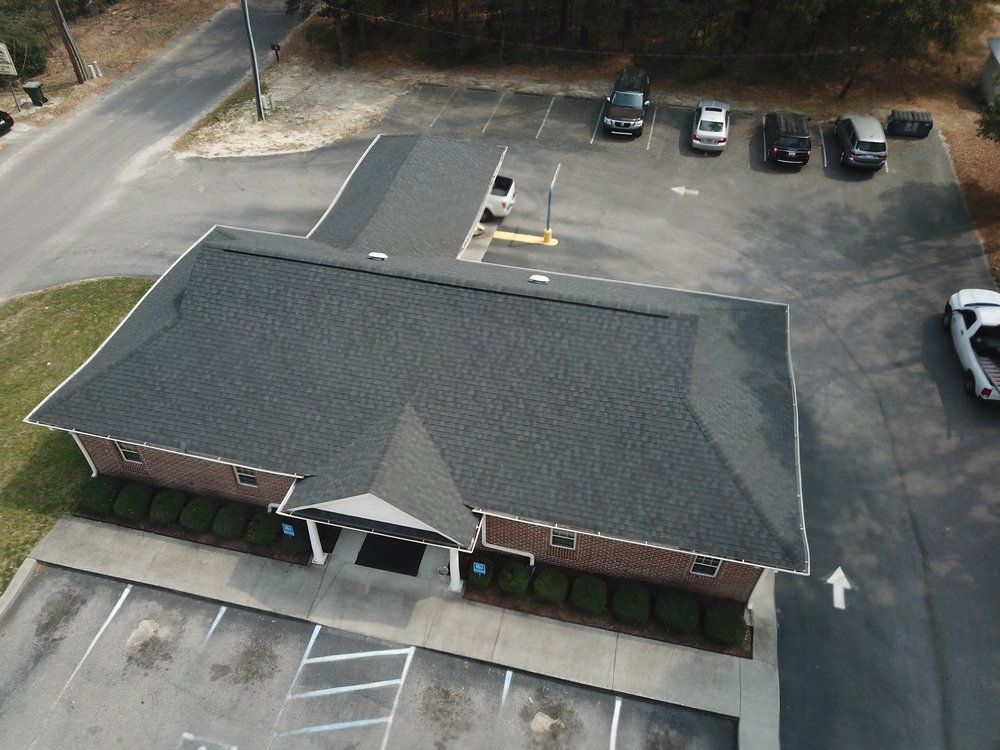 Slide of LandShark Roofing