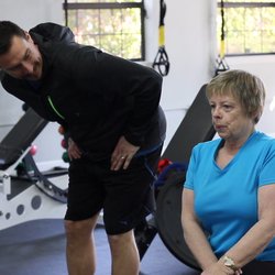 Live Good Fitness - Mac Helping a client achieve proper form