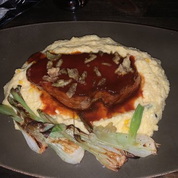Bosscat Kitchen & Libations - Bbq Pork loin with a buttery Polenta. - Bars Near Me - Orange, California Bosscat Kitchen & Libations - Bbq Pork loin with a buttery Polenta. - Bars Near Me - Orange, California