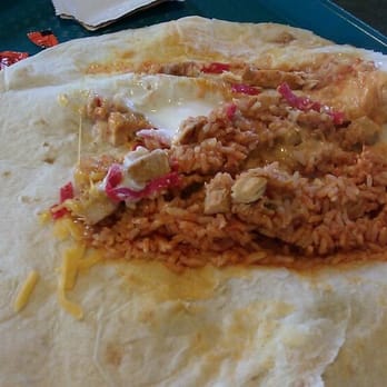 Taco Bell - Volcano Burrito made with Chicken, opened up to add hot sauce. - Fast Food Near Me - Honolulu, Hawaii Taco Bell - Volcano Burrito made with Chicken, opened up to add hot sauce. - Fast Food Near Me - Honolulu, Hawaii