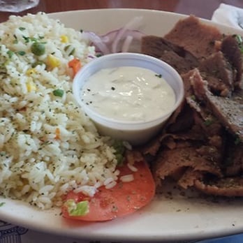 Gyro World - Beef and lamb gyro with rice and a greek salad... - Greek Near Me - Flushing, New York Gyro World - Beef and lamb gyro with rice and a greek salad... - Greek Near Me - Flushing, New York