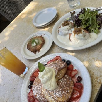 Cream Pot - Mixed berry soufflé pancakes, eggs Benedict, side of hash browns, & strawberry orange juice - Breakfast & Brunch Near Me - Honolulu, Hawaii
