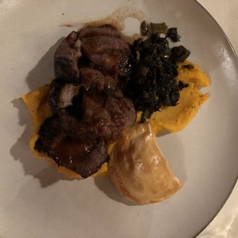 Rainbow Lodge - Grilled lamb ribeye. Braised lamb shoulder empanada, Swiss chard, butternut purée. - New American Near Me - Houston, Texas Rainbow Lodge - Grilled lamb ribeye. Braised lamb shoulder empanada, Swiss chard, butternut purée. - New American Near Me - Houston, Texas