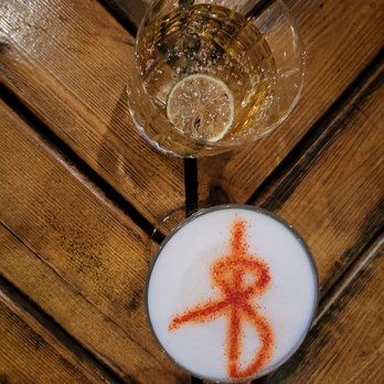 The Snug - Peanut Butter Milk Punch (top) - liquid PB!! % The Sour (bottom) - love the bow! Yummy - Cocktail Bars Near Me - San Francisco, California