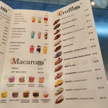 Croffle House - Menu - Menu from Croffle House in Flushing, NY, showing a selection of croffles with flavors like plain, chocolate almond, and blueberry cream cheese, along with smoothies in flavors such as strawberry, blueberry, and peach. The menu also offers macarons including blueberry crunch, chocolate, rainbow crunch, and berry cheddar, with prices listed for single items and gift boxes. The menu is printed on a paper with colorful images of the items and a modern design. - Bakeries Near Me - Flushing, New York