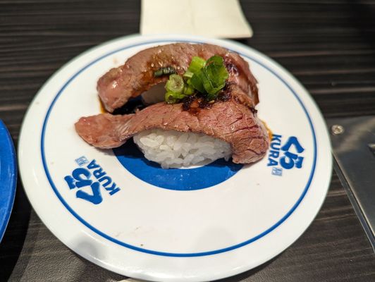 Kura Revolving Sushi Bar by null