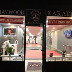 Maywood Karate - Outside of the dojo - front window at night.