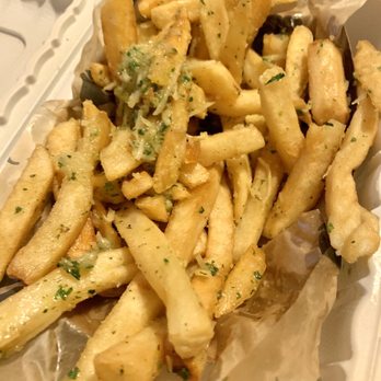 Fire Wings - Garlic fries- too garlic-y for my taste, seasoned fries ftw - Chicken Wings Near Me - Alameda, California