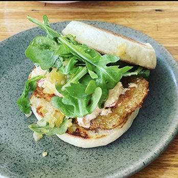 Husk - Fried green tomato on sourdough with house made pimento sauce, arugula and pickle relish. - American Near Me - Charleston, South Carolina Husk - Fried green tomato on sourdough with house made pimento sauce, arugula and pickle relish. - American Near Me - Charleston, South Carolina