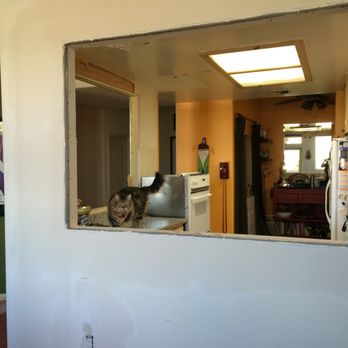 F&A Construction - Kitchen remodel - 2. Small "windows" in kitchen enlarged. Cat's name is Josh. Workers watched out for him. - General Contractors Near Me