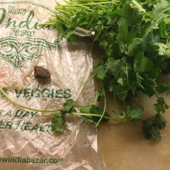 New India Bazar - A big stone from the cilantro bunch which I took for cooking,heard a noise then saw it falling from the bunch.let the owners to know. - Grocery Near Me - Dublin, California New India Bazar - A big stone from the cilantro bunch which I took for cooking,heard a noise then saw it falling from the bunch.let the owners to know. - Grocery Near Me - Dublin, California
