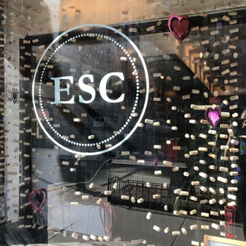 Eastside Cellars - a glass window with a sign that says esc - Beer, Wine & Spirits Near Me - New York, New York Eastside Cellars - a glass window with a sign that says esc - Beer, Wine & Spirits Near Me - New York, New York