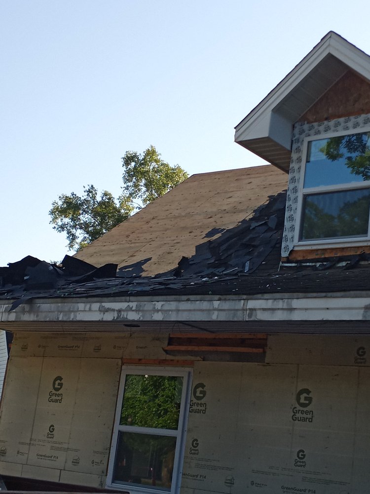 Slide of R and R Roofing Services