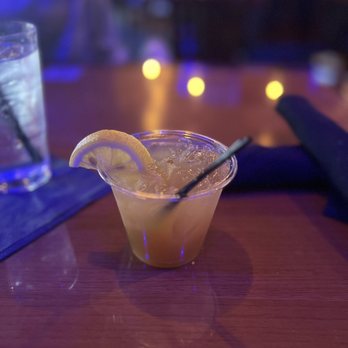 Fin & Feathers - Melrose drink peach ciroc and pineapple juice - Soul Food Near Me - Atlanta, Georgia