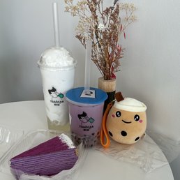Taro Latte, Ice Coconut Slush with Crystal pearl & Coconut Jelly & Ube Mille Crepe Also cute boba keychain from my giveaway winnings Taro Latte, Ice Coconut Slush with Crystal pearl & Coconut Jelly & Ube Mille Crepe Also cute boba keychain from my giveaway winnings