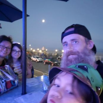 Boardwalk Cafe & Pub - Sitting outside with the fam waiting for our tendies!! - Seafood Near Me - Hampton, New Hampshire