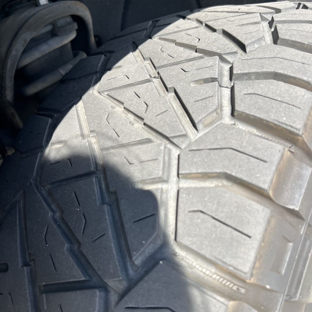 5,000 miles on these tires and due to a poor alignment they are wearing unevenly. 5,000 miles on these tires and due to a poor alignment they are wearing unevenly.