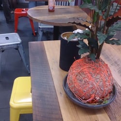 Little Saigon Grill - Fresh and quirky centrepieces decorate the varied seating spaces at LSG.
