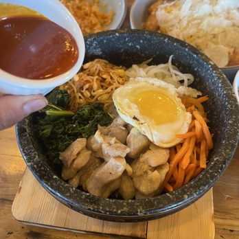 Step Korean Bistro - This is the Bibimbop with chicken. It's in a hot stone bowl that sizzles the rice. Delish! - Korean Near Me - Sparks, Nevada Step Korean Bistro - This is the Bibimbop with chicken. It's in a hot stone bowl that sizzles the rice. Delish! - Korean Near Me - Sparks, Nevada