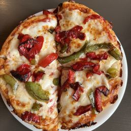 Personal pan pizza with roasted peppers. Personal pan pizza with roasted peppers.