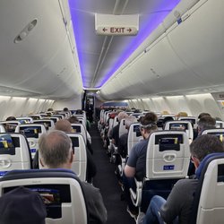 United Airlines - Pretty full flight, but managed to have an open middle seat beside me!