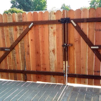 Custom Service Center - The back side of the RV gate, showing the sturdy construction, hinges, latches and drop-rods. - Handyman Near Me Custom Service Center - The back side of the RV gate, showing the sturdy construction, hinges, latches and drop-rods. - Handyman Near Me